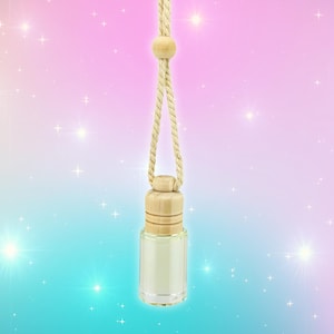 May include: A clear glass bottle with a wooden cap and a beige rope for hanging. The bottle is empty and has a simple, minimalist design. The background is a gradient of pink and blue with sparkling stars.