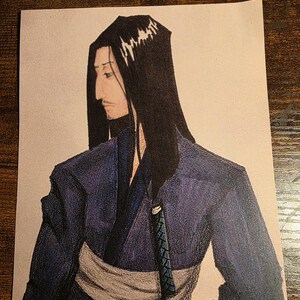 May include: A colored pencil drawing of a person with long black hair, a goatee, and a side profile view. The figure wears a dark purple robe with a wide light gray sash and a blue sword hilt visible at the waist against a plain white background.