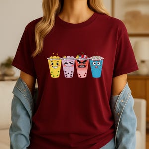 Boba Tea Emotionen Cartoon T-Shirt Ausdrucksstarke Bubble Tea Gesichter Kawaii Anime Foodie Bold Color Pop Statement T-Shirt