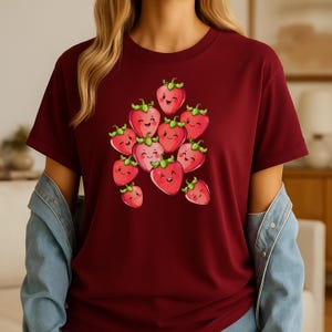 Camiseta vintage con ilustración de cuento de fresas, escena de frutas de dibujos animados caprichosos, camiseta de coleccionista artística retro, estampado nostálgico y lúdico