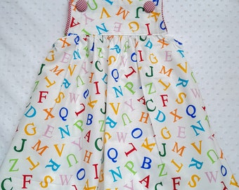 Classic style girls jumper (blouse not included) - choice of fabric including shown Alice in Wonderland theme - sizes 12 mos - 4T