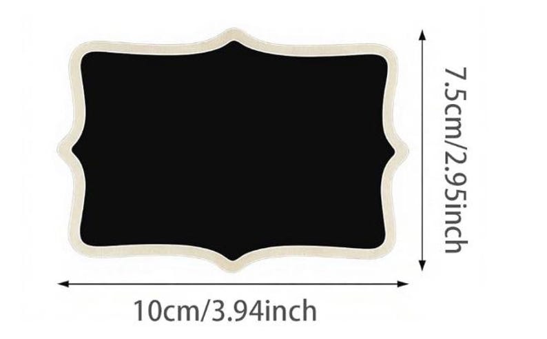 May include: A rectangular chalkboard with a decorative, scalloped edge. The black surface measures 10cm (3.94 inches) wide and 7.5cm (2.95 inches) high. The frame is a light beige color.