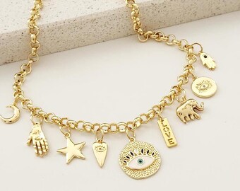 Collar dorado con múltiples dijes: Ojo malvado, Elefante, Estrella - Joyería bohemia hippie
