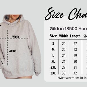 May include: A light gray Gildan 18500 hoodie with a size chart. The chart shows measurements in inches for width, length, and sleeve length, ranging from size S to 3XL. The hoodie has a hood and a front pocket.