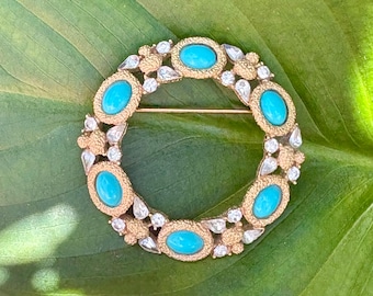 Trifari Turquoise Oval Cabochon, Clear Teardrop Rhinestone Gold Wreath Brooch