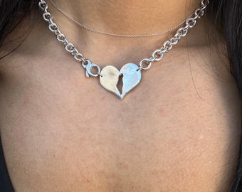 Return To Israel. Israel shape cut out from a heart hangs on a heavy chain connected with infinity clasp.