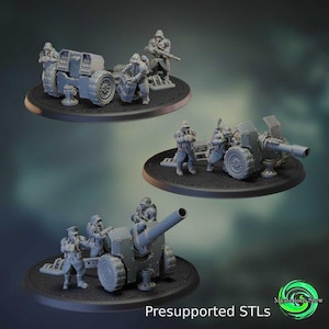 Puede incluir: Tres modelos de artillería grises en miniatura con soldados sobre bases circulares negras. Los modelos incluyen cañones y soldados uniformados. El texto "Presupported STLs" es visible en la parte inferior de la imagen.