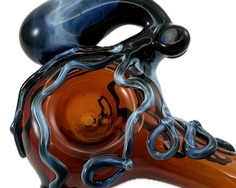 Octopus Glass Pipe Spoon. Hand Blown Heady Tobacco Pyrex Amber with Fade to Black Octopi. Ready to ship, in stock, Ships next business day.