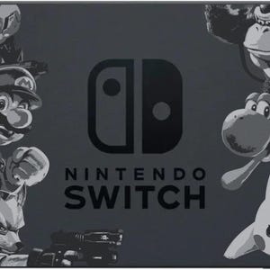 May include: A black and gray Nintendo Switch console featuring various characters from the Super Smash Bros. series. The console has the Nintendo Switch logo and the words "NINTENDO SWITCH" printed on it.