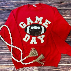 Girocollo in ciniglia con scritta rossa per il giorno della partita di football, glitter dorati e paillettes!!