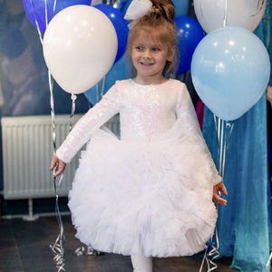 toddler girl white graduation dress Is your little one graduation ready? From kindergarten to grade one, we design the perfect custom dress to celebrate her big milestone in style. , #GraduationDress #LittleGirlFashion