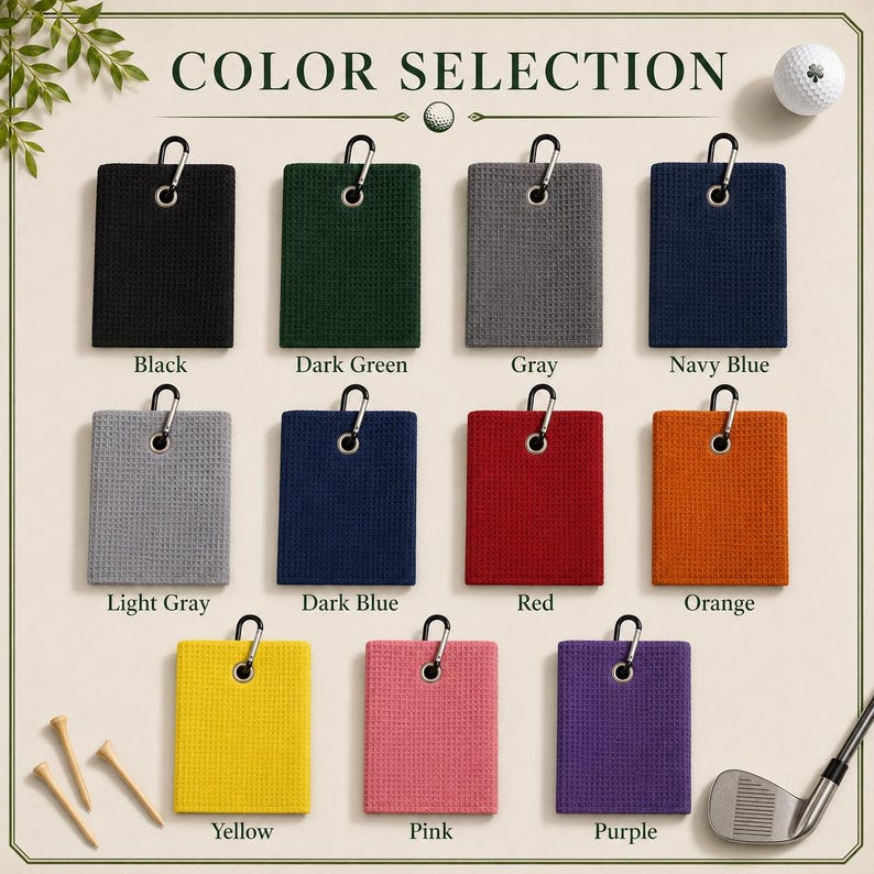 Puede incluir: Una colecci&oacute;n de once toallas de golf rectangulares con textura de gofre, cada una con un mosquet&oacute;n de metal. Los colores incluyen negro, verde oscuro, gris, azul marino, gris claro, azul oscuro, rojo, naranja, amarillo, rosa y morado.