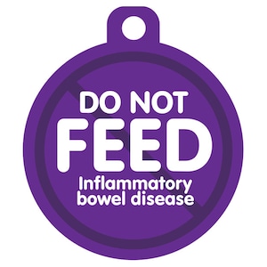 May include: Purple round tag with a diagonal red line through it. The tag says "DO NOT FEED" in white text with "Inflammatory bowel disease" in smaller white text below.