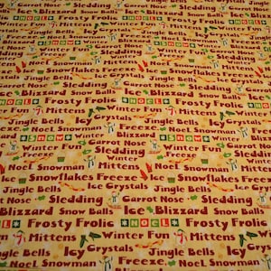 Snow Words on Tan Fabric by Debbie Munn