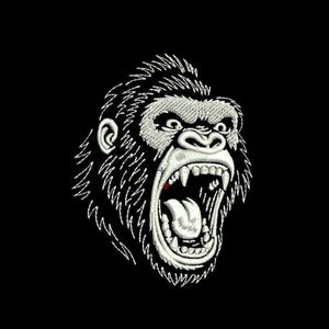 May include: An embroidered gorilla head with an open mouth, revealing teeth and a red tongue. The gorilla's face is detailed with white thread against a black background, showing its fur and facial features.