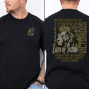 May include: Black t-shirt featuring a lion graphic and the text "Weep not: Behold, the Lion of the Tribe of Juda" and "Revelation 5:5" on the back. The front of the shirt has a smaller lion graphic with a cross.