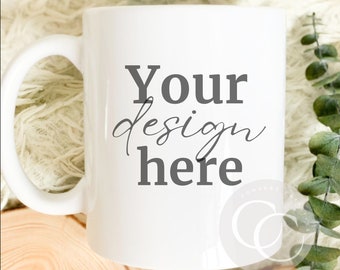 May include: White ceramic mug with a black inscription that reads "Your design here".