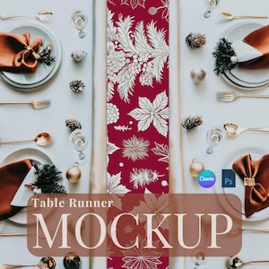 May include: A festive table setting with a burgundy table runner featuring a white floral design. The table is set with gold cutlery, white plates, and rust-colored napkins. The text "Table Runner MOCKUP" is visible.