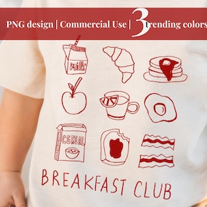 May include: Red line drawing of breakfast foods on a white t-shirt. The design includes a carton of milk, a croissant, a stack of pancakes, an apple, a cup of tea, a fried egg, a box of cereal, a slice of toast, and bacon. The text "BREAKFAST CLUB" is printed below the drawings.