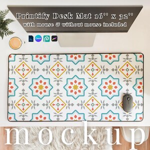 May include: A rectangular desk mat with a colorful geometric pattern in teal, orange, yellow, and gray. The mat is 16 inches by 32 inches and includes a mouse. The text "Printify Desk Mat 16" x 32" with mouse & without mouse included" is visible.