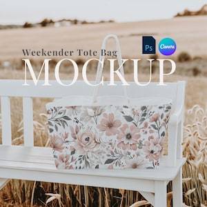 May include: A white canvas tote bag with a floral print sits on a white bench. The bag has two handles and is a great option for carrying everyday essentials.