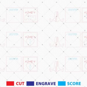 Puede incluir: Dise&ntilde;os cortados con l&aacute;ser con motivos de coraz&oacute;n y piezas de rompecabezas, la palabra "Family" y la frase "You are the missing piece to me." Los dise&ntilde;os son en rojo, azul y celeste, con soportes de exhibici&oacute;n.