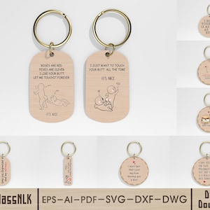 May include: A selection of wooden keyrings with gold-tone rings. The keyrings feature humorous phrases and illustrations, including phrases like "I like your butt" and "I hope your day is as nice as my butt."