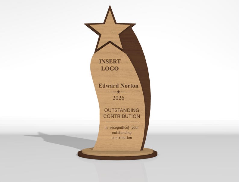 May include: A wooden award plaque featuring a star at the top and a curved design. The text reads: INSERT LOGO, Edward Norton, 2026, OUTSTANDING CONTRIBUTION, and in recogniticof your outstanding contribution. The plaque has a light and dark wood finish.