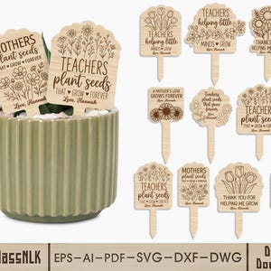 May include: Wooden plant markers with engraved floral designs and text. One marker reads "Mothers plant seeds that grow forever." Another reads "Teachers plant seeds that grow forever." A green ceramic pot is in the image.