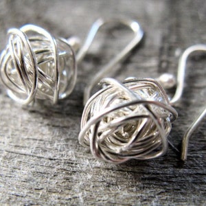 Sterling silver yarn ball earrings