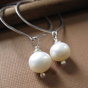 Lotus hoop earrings with freshwater pearl image 1