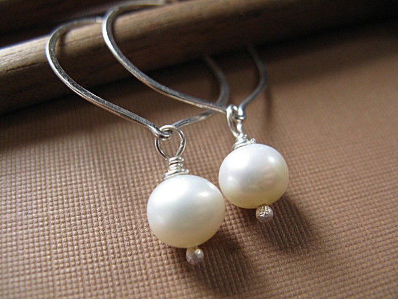 Lotus hoop earrings with freshwater pearl image 1