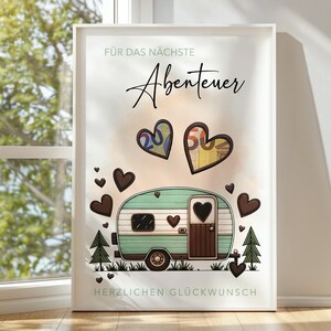 May include: A framed print featuring a teal and white camper illustration with brown heart accents. The print includes the German text "F&uuml;r das n&auml;chste Abenteuer" and "Herzlichen Gl&uuml;ckwunsch". Two heart-shaped designs display the numbers 20 and 50.