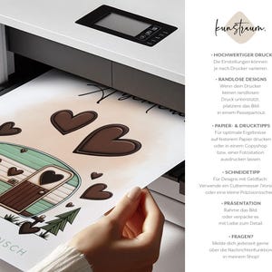 May include: A print of a teal and brown camper with heart accents and the word "Wunsch" on the bottom left. The print is being produced by a printer. Brown hearts are scattered across the print.