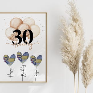 May include: A framed print with a birthday theme. The artwork features a cluster of beige balloons and heart-shaped balloons made of currency. The number "30" is prominently displayed, with the words "Happy Birthday to you" written below.