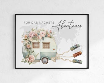 May include: A framed print featuring a vintage camper adorned with flowers. The camper is light blue and white, with a floral arrangement on top. The text "FÜR DAS NÄCHSTE Abenteuer" is written above the camper, with rolled-up money trailing behind.
