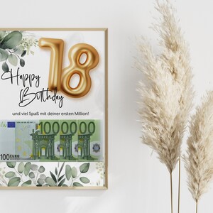 May include: A framed birthday card with a gold foil number 18 balloon and the text "Happy Birthday" and "und viel Spa&szlig; mit deiner ersten Million!"  The card also features a green and white floral design and a picture of four 100 euro bills.