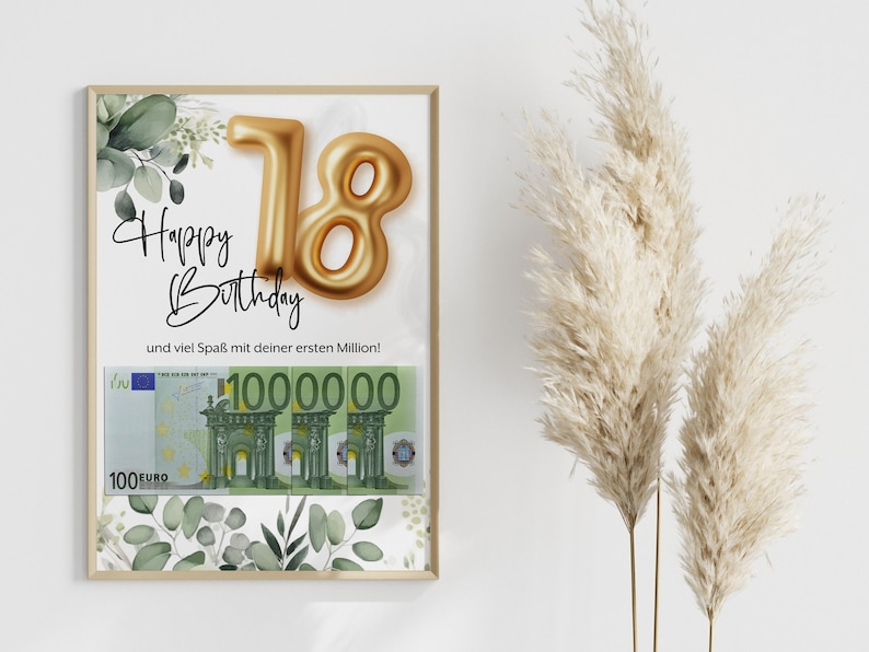 May include: A framed birthday card with a gold foil number 18 balloon and the text "Happy Birthday" and "und viel Spa&szlig; mit deiner ersten Million!"  The card also features a green and white floral design and a picture of four 100 euro bills.