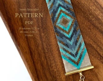 May include: A loom bracelet pattern PDF with a geometric design in shades of blue, turquoise, gold, and white. The pattern is for a bracelet that is 1.33 inches wide and 5.85 inches long and uses 9 colors.
