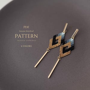 May include: A pair of beaded earrings with a geometric design. The earrings feature a diamond-shaped pattern in gold, black, and blue beads, with a gold bar and a long gold dangle. The image includes the text "PATTERN BEADED EARRINGS 6 COLORS".