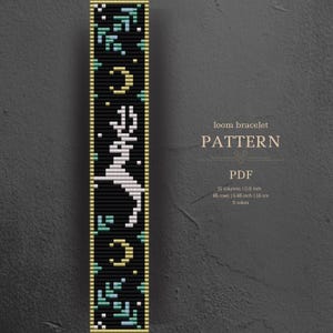May include: A loom bracelet pattern PDF featuring a black background with a white deer silhouette, gold crescent moons, and teal foliage accents. The text reads: loom bracelet PATTERN PDF, 15 columns | 0.9 inch, 85 rows | 5.85 inch | 16 cm, 5 colours.