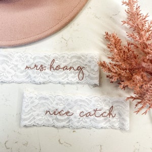 Personalized / Monogrammed Embroidered WHITE  Lace Wedding and Toss Garters.  Something Blue! Nice Catch Garter / You're Next!