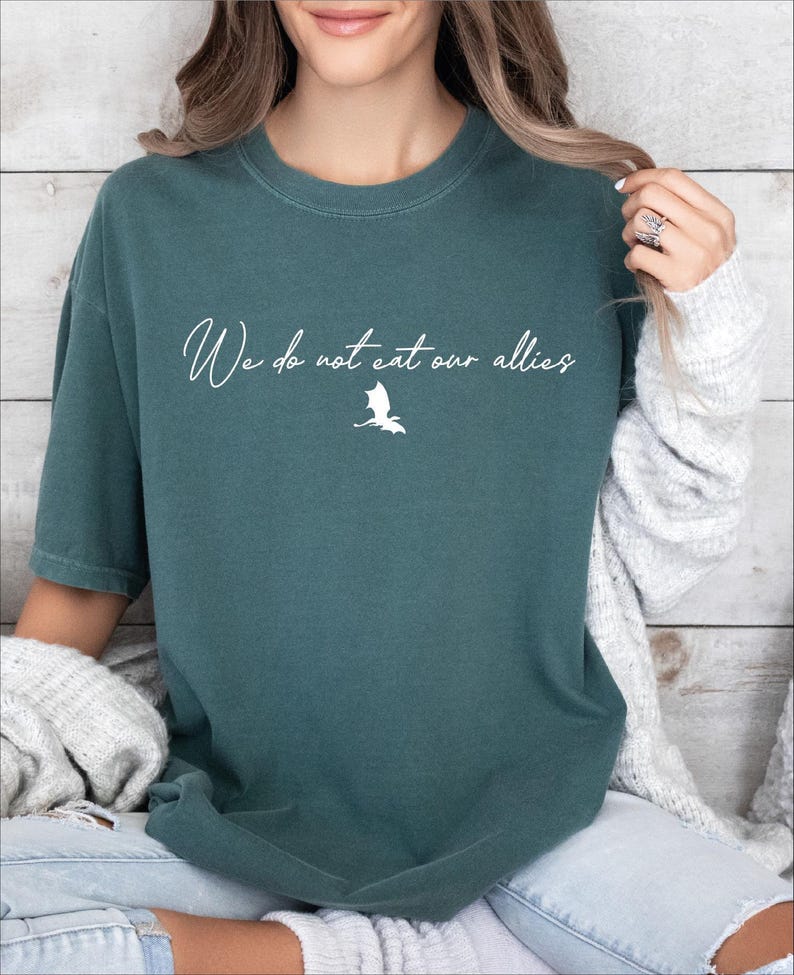 a woman wearing a t - shirt that says we do not allow others