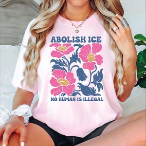 Floral Abolish ICE Human is Illegal Shirt, Political Resistance Shirt, Anti-Trump Activist Wear, Comfort Colors No Human is Illegal Shirt