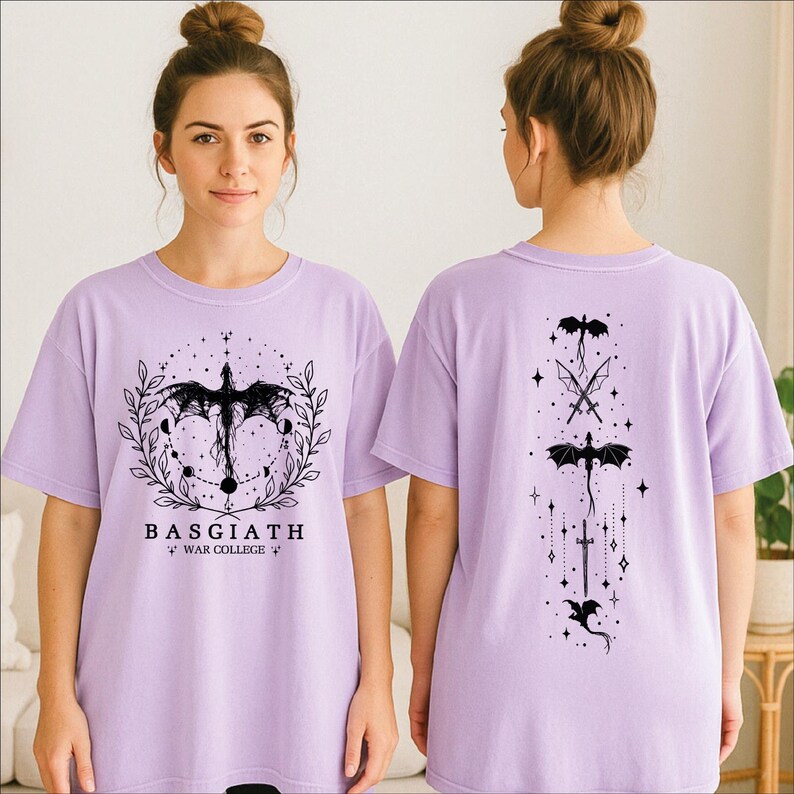 A woman wearing a purple t-shirt with a dragon design and text on it.