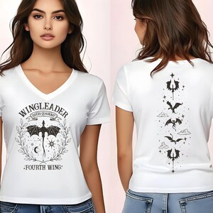 A woman wearing a white t-shirt with a graphic design featuring a dragon and the text "WINGLEADER" and "ROGERS QUADRUPLE" printed on it.