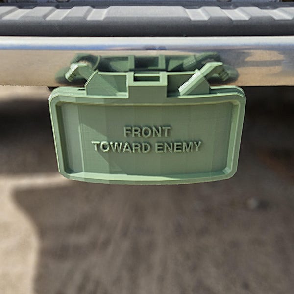 Hitch Cover (Military Claymore mine in gloss Army green) Width 7.185" Depth 5.41" Height 4.1"