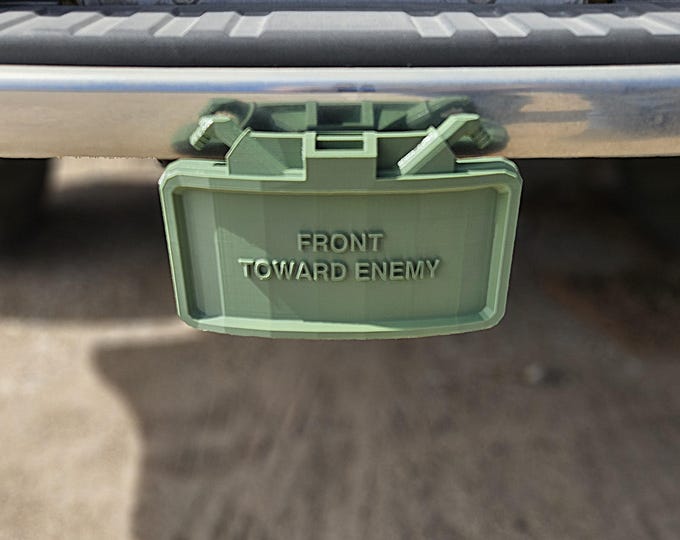 Hitch Cover (Military Claymore mine in gloss Army green) Width 7.185" Depth 5.41" Height 4.1"