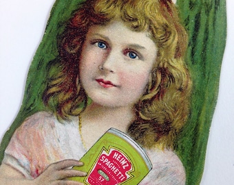 Vintage Heinz Trading Card Shaped Like a Pickle with Girl Holding a Can of Heinz Spaghetti
