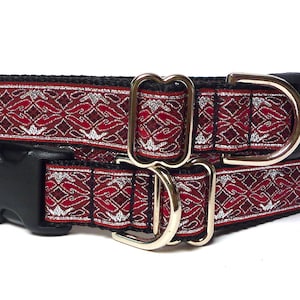 Red metallic dog collar with buckle in a medieval renaissance design, Old English